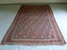 An antique Caucasian rug